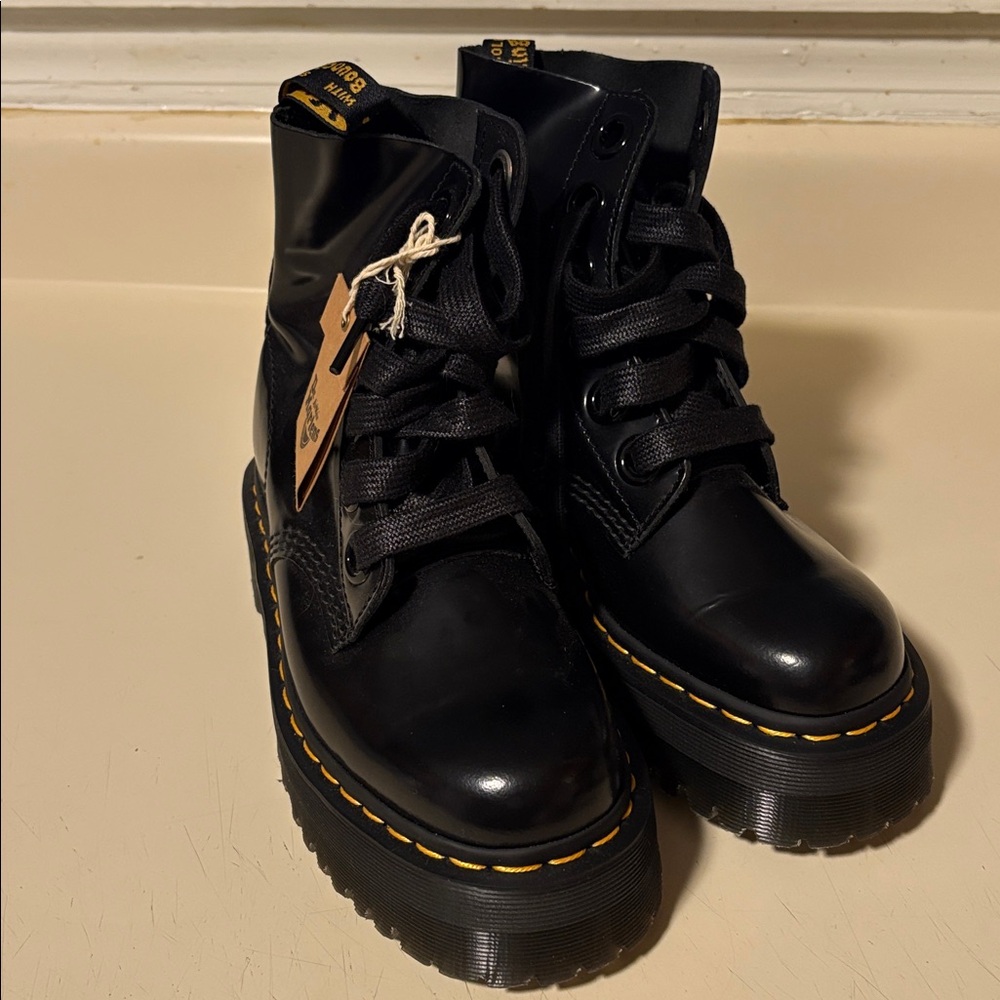 Dr. Martens Shiny Black Boots with Yellow Stitching
